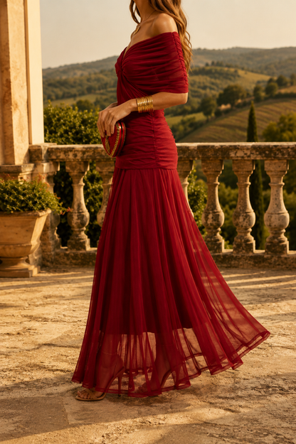 Abito lungo elegante con scollo drappeggiato