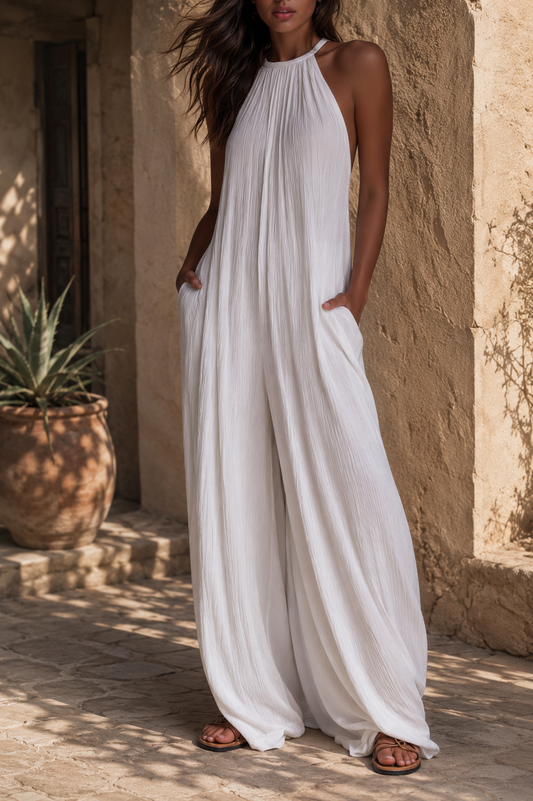 Tuta elegante smanicata con pantaloni palazzo